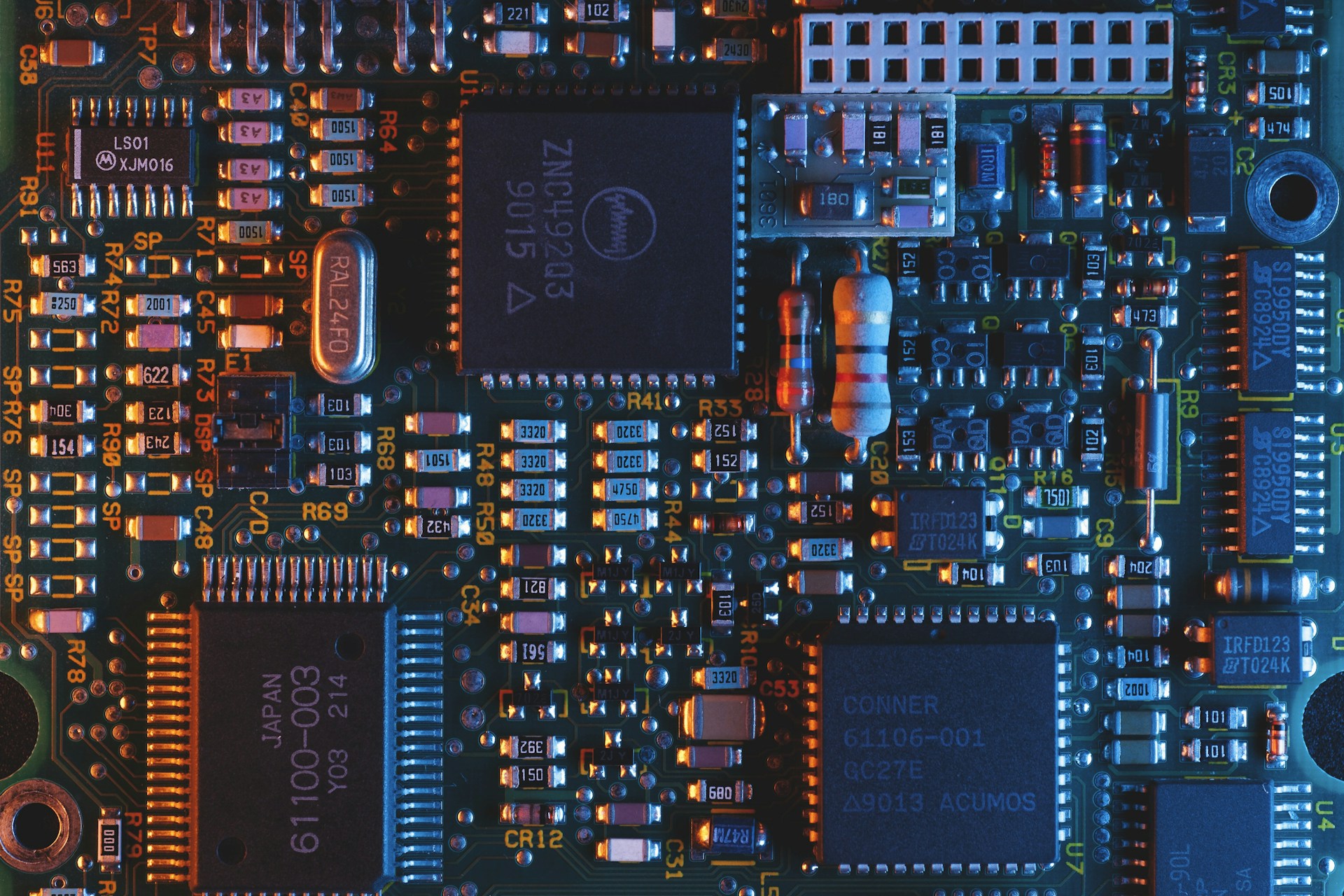 Close-up of electronic components on a printed circuit board. Stock photograph by Umberto.